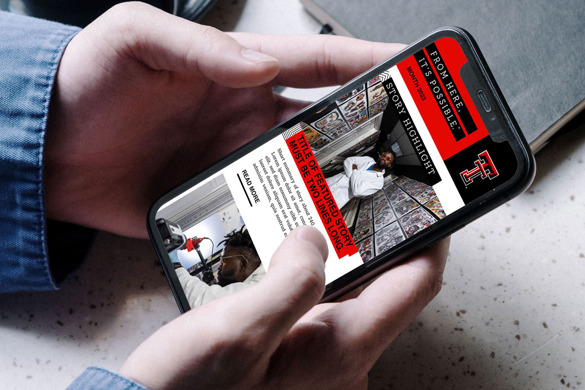 A person holding a phone that displays the newsletter.